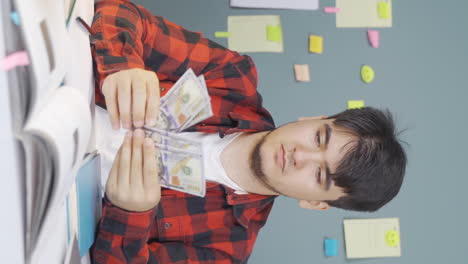 Vertical-video-of-Money-Saver-male-student.